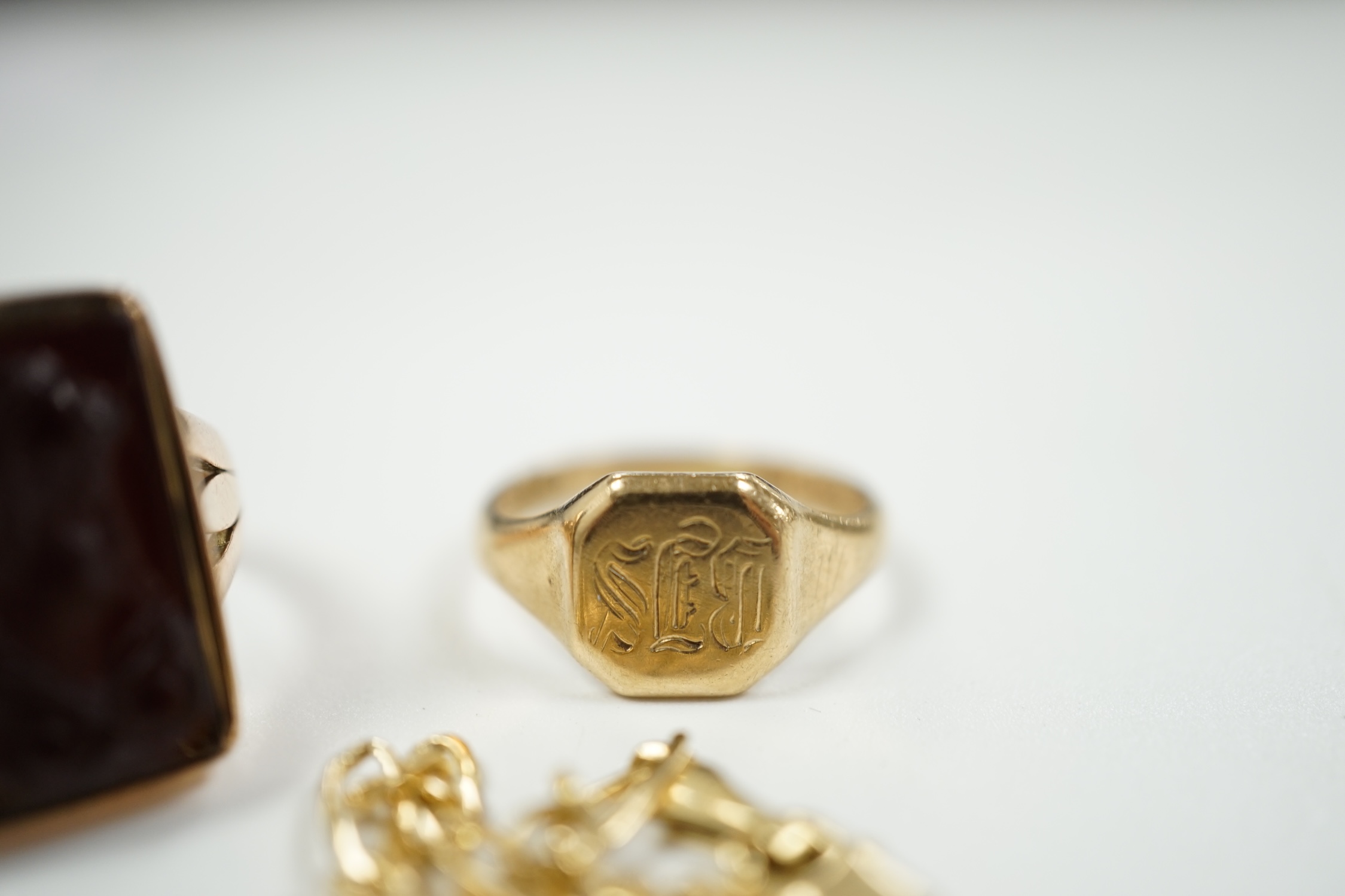 A modern 9ct gold and hardstone cameo set ring, size M, a small 9ct gold signet ring and an Italian 14kt bracelet